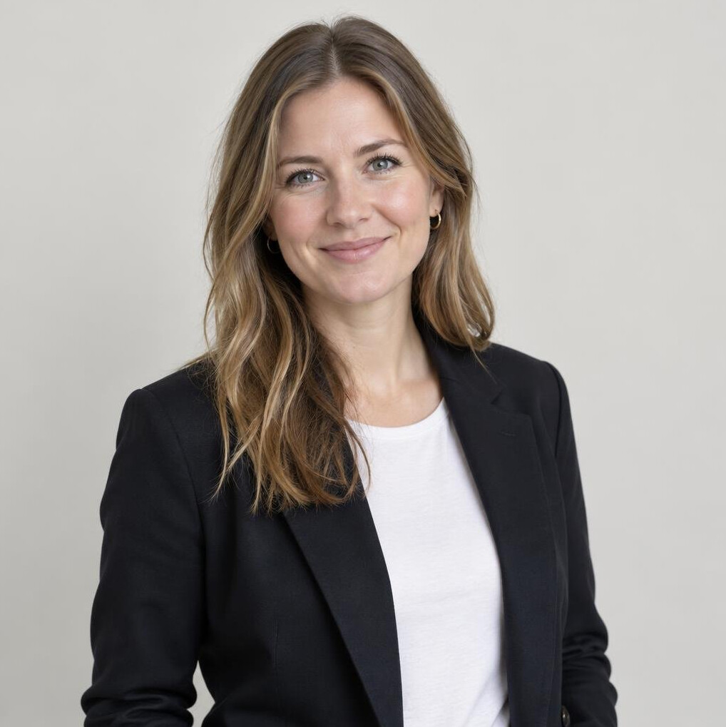 Portrait of a smiling woman with light brown hair